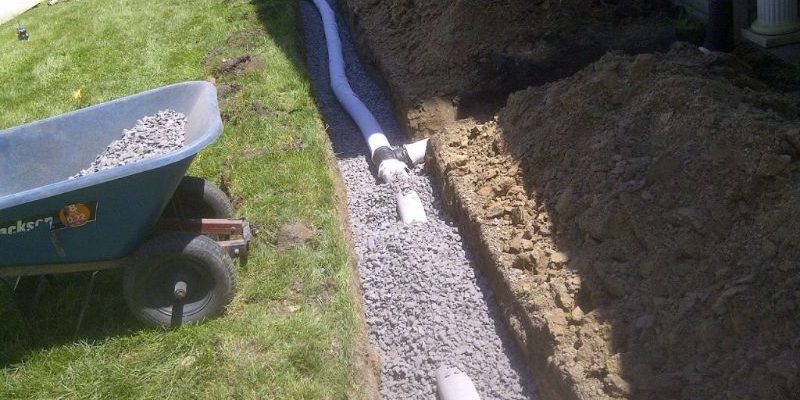 French drain system installation in North Canton Ohio residential property